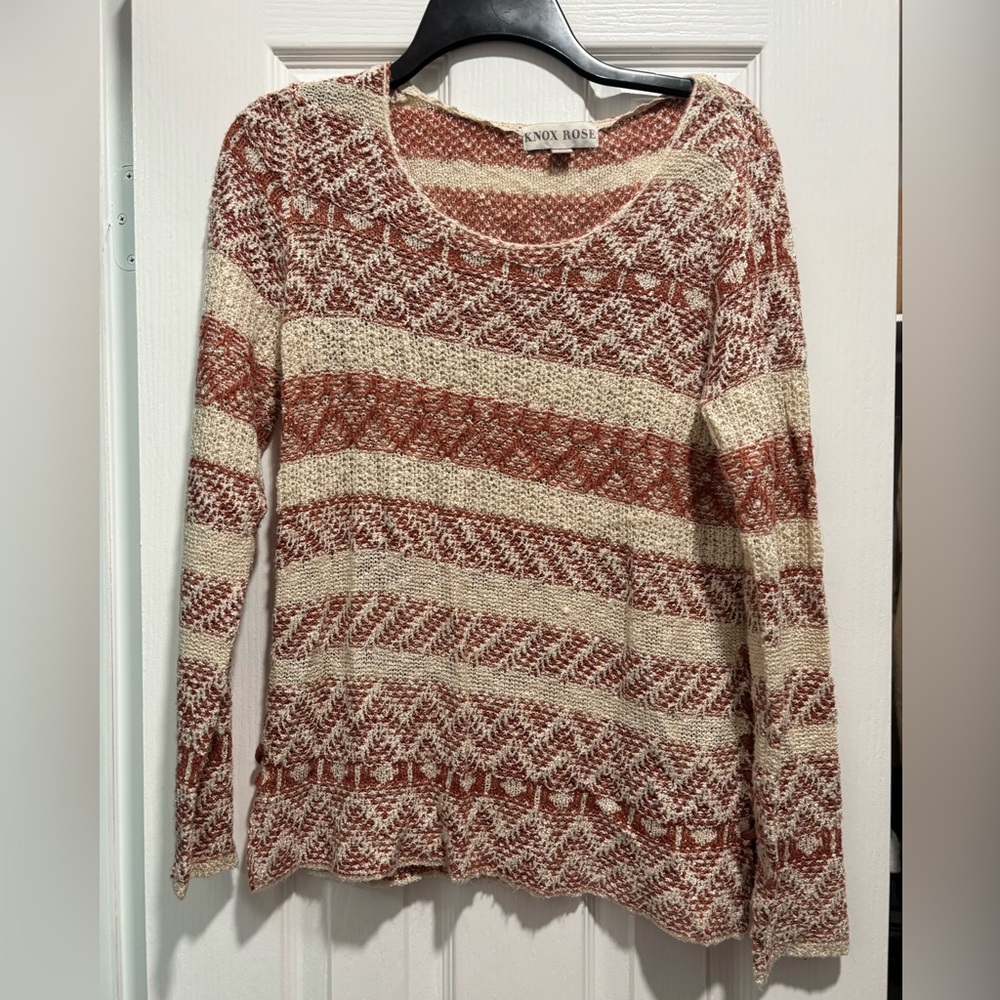 Small orange and cream striped sweater